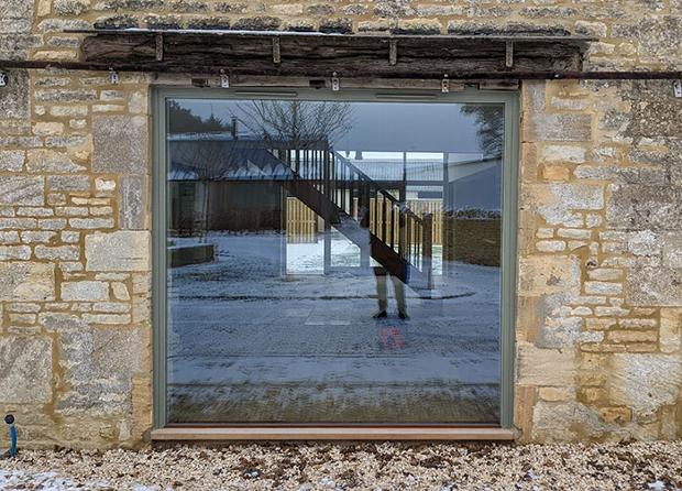 Cleaned window in old converted barn